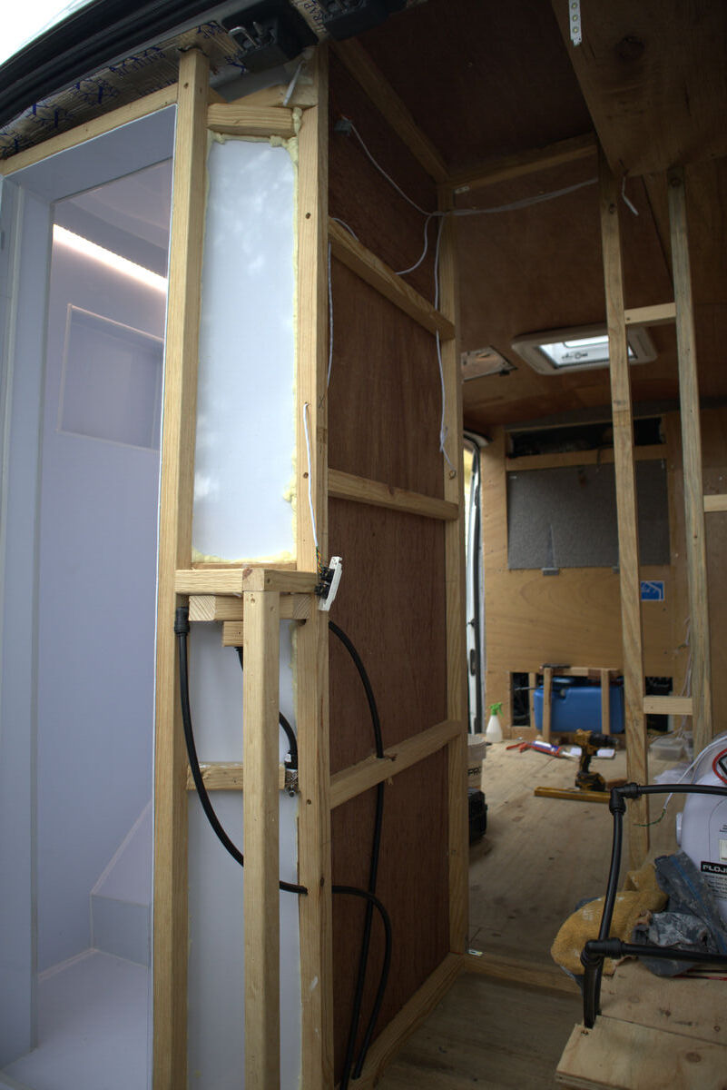 Plumbing pipe runs visible before walls went on